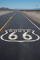 Rolgordijnen Route 66 highway shield painted on road in California © Michael Flippo