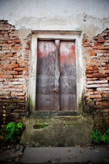 old door of brick building