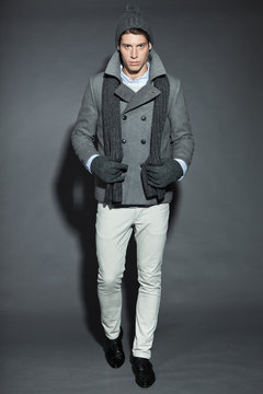 Man winter fashion. Handsome man isolated.