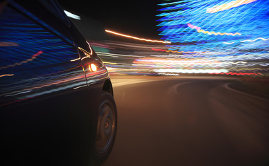 Obraz premium Speed drive on car at night motion blurred