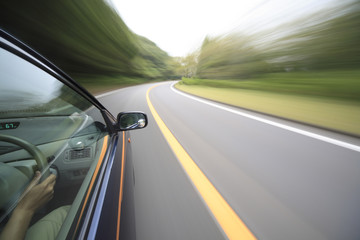 Obraz na płótnie Canvas Driving at mountain road