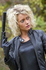 Sexy Woman with silencer gun