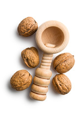 wooden nutcracker and walnuts