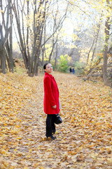 pretty girl in the autumn forest