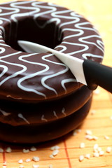 delicous german baumkuchen with a knife inseide