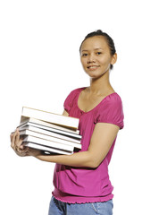 College Student Carrying Stack Of Books