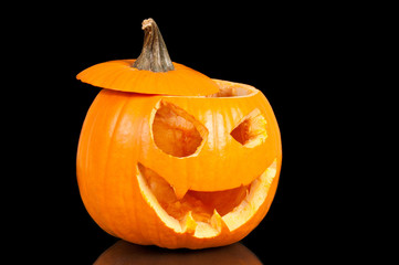 Halloween pumpkin on black background.