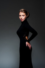 alluring woman in black evening dress