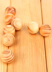 Wooden balls on wooden background