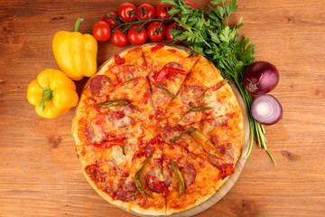 Tasty pepperoni pizza with vegetables