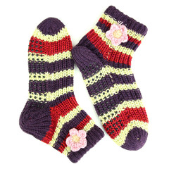 Pair of knit striped socks isolated on white