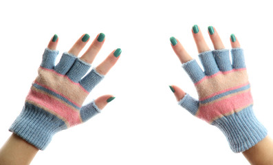 woman knitted gloves on hands, isolated on white
