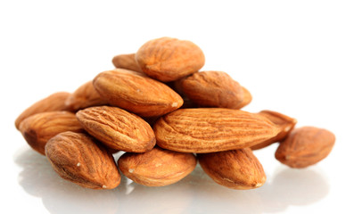 tasty almonds nuts, isolated on white