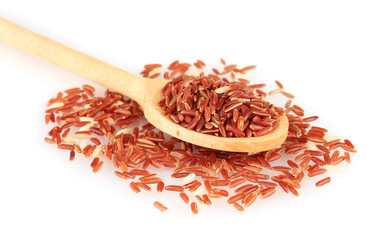red rice  in wooden  spoon isolated on white background
