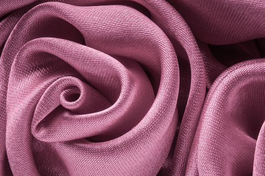 Close Up Of Shiny Light Purple Fabric Flower.