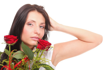 Closeup portrait of attractive young woman holding a red rose