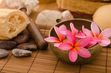 tropical spa setup with  frangipani flower