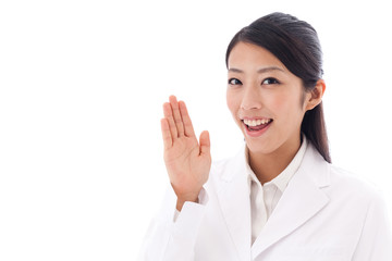 a young asian doctor on white background