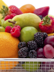 Naklejka na ściany i meble fruit filled shopping basket
