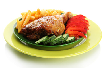 Roast chicken with french fries and cucumbers