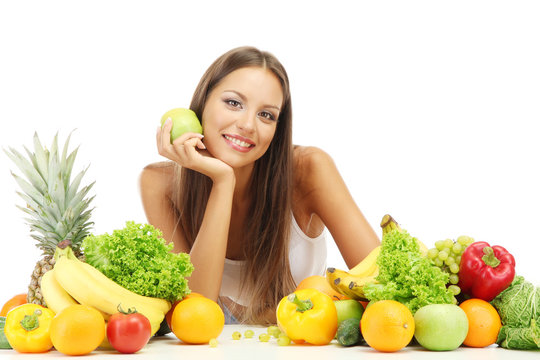 Fototapeta beautiful young woman with fruits and vegetables, isolated