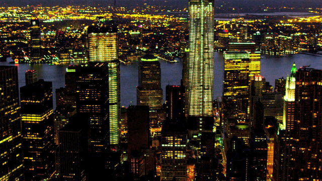 Aerial view of Manhattan illuminated at night, New York, USA