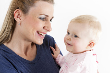 portrait of mother with her baby girl