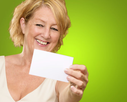 Mature Woman Showing Blank Business Card