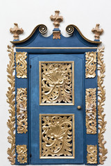 Golden door. Interior of baroque church in Poland