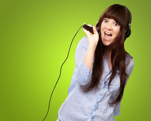 Girl With Headset Singing On Mike