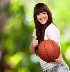 Portrait Of A Young Female With A Football Soccer Ball