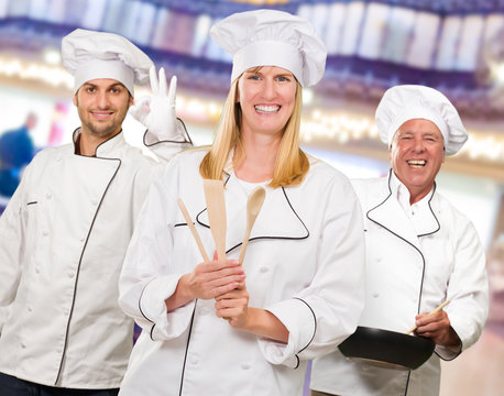 Group Of Happy Chef's At Work