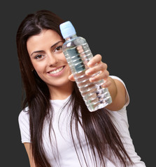Young Girl Holding Bottle Of Water