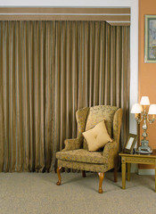 The elegance living room with matching curtain and armchair