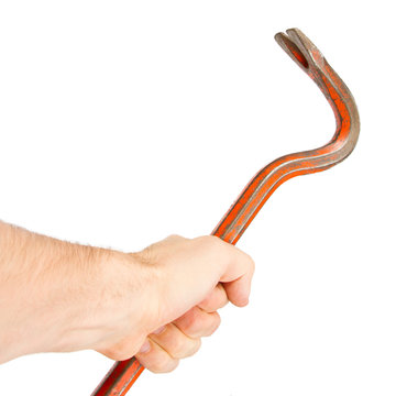 Hand holding old red crowbar