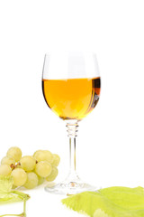 Branch of grapes and glass of wine