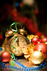 Clock and christmas balls - holiday background