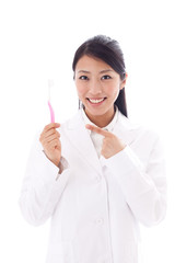 a young asian doctor on white background