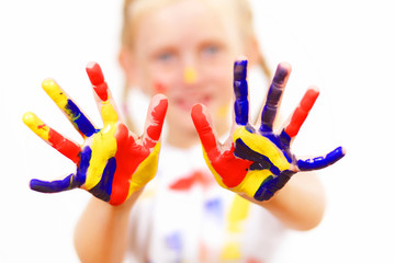 happy child with paint on the hands