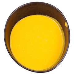 pumpkin soup in black tureen