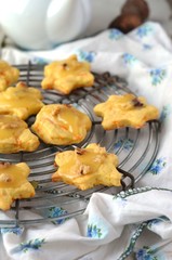 Pumpkin cookies with a piece of taffy and nuts