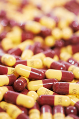yellow brown capsule pills medicine antibiotic