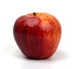 Whole red apple isolated on white background.