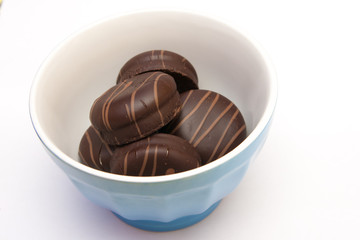 Sweet cake with chocolate on plate