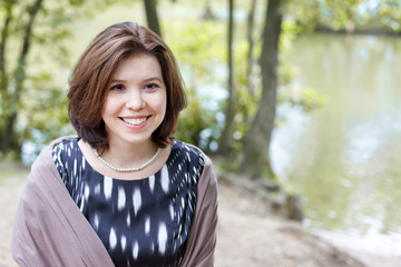 Fototapeta premium Beautiful young girl in summer forest