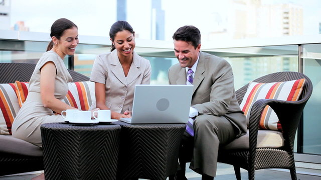 Successful multi ethnic management team discussing investment banking 