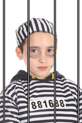 A view of a sad prisoner in jail
