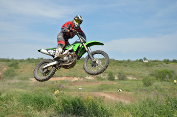 MX rider flies through the air