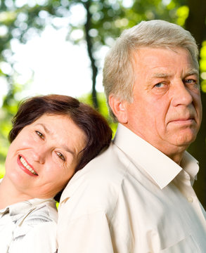 Senior happy couple embracing, outdoors