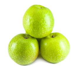 Three juicy apples lay on white background..